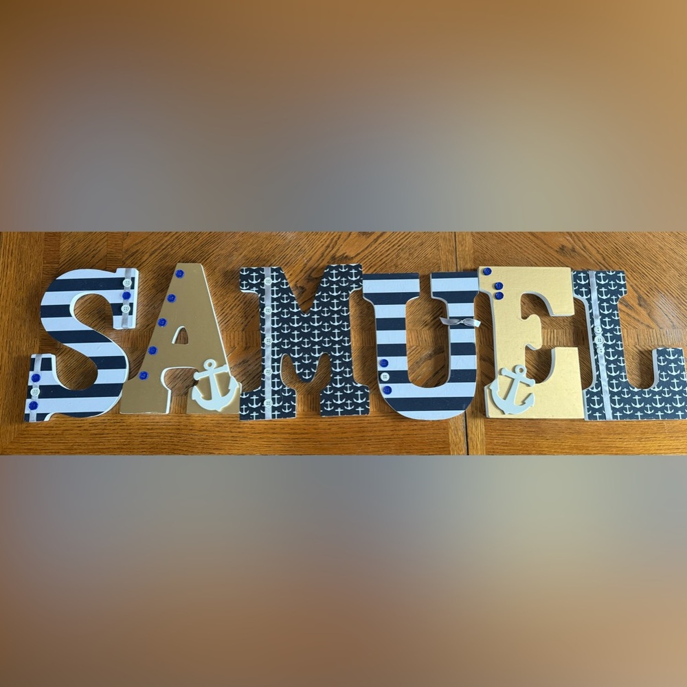 Nautical letters spelling “SAMUEL”